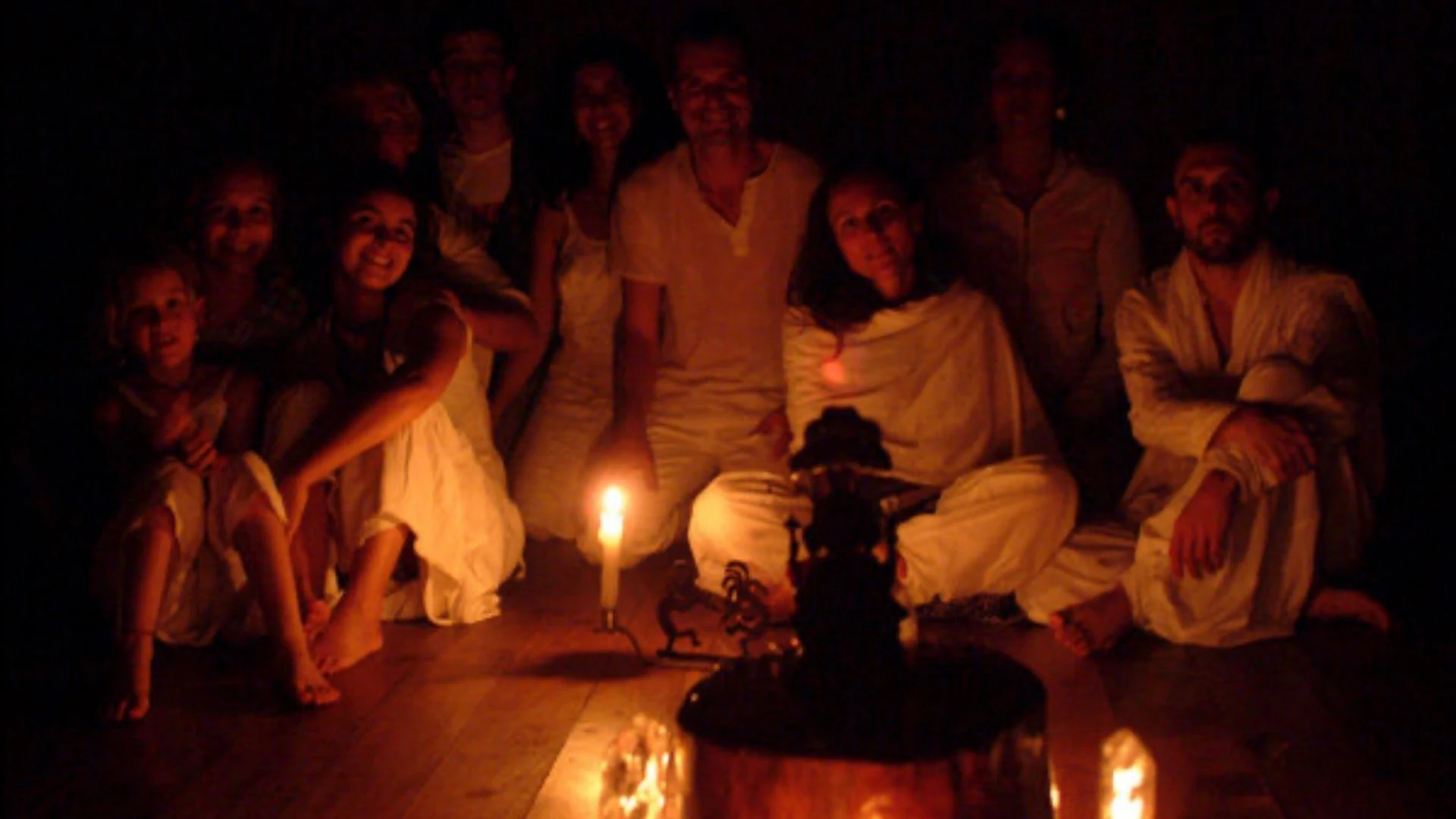 Plant medicine integration for parents — a parent at home holding the openings of a ceremony in daily life.